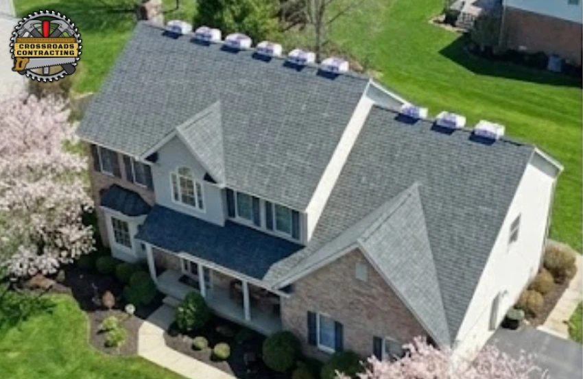 Roofing Contractor in North Beach MD performing a residential roof inspection