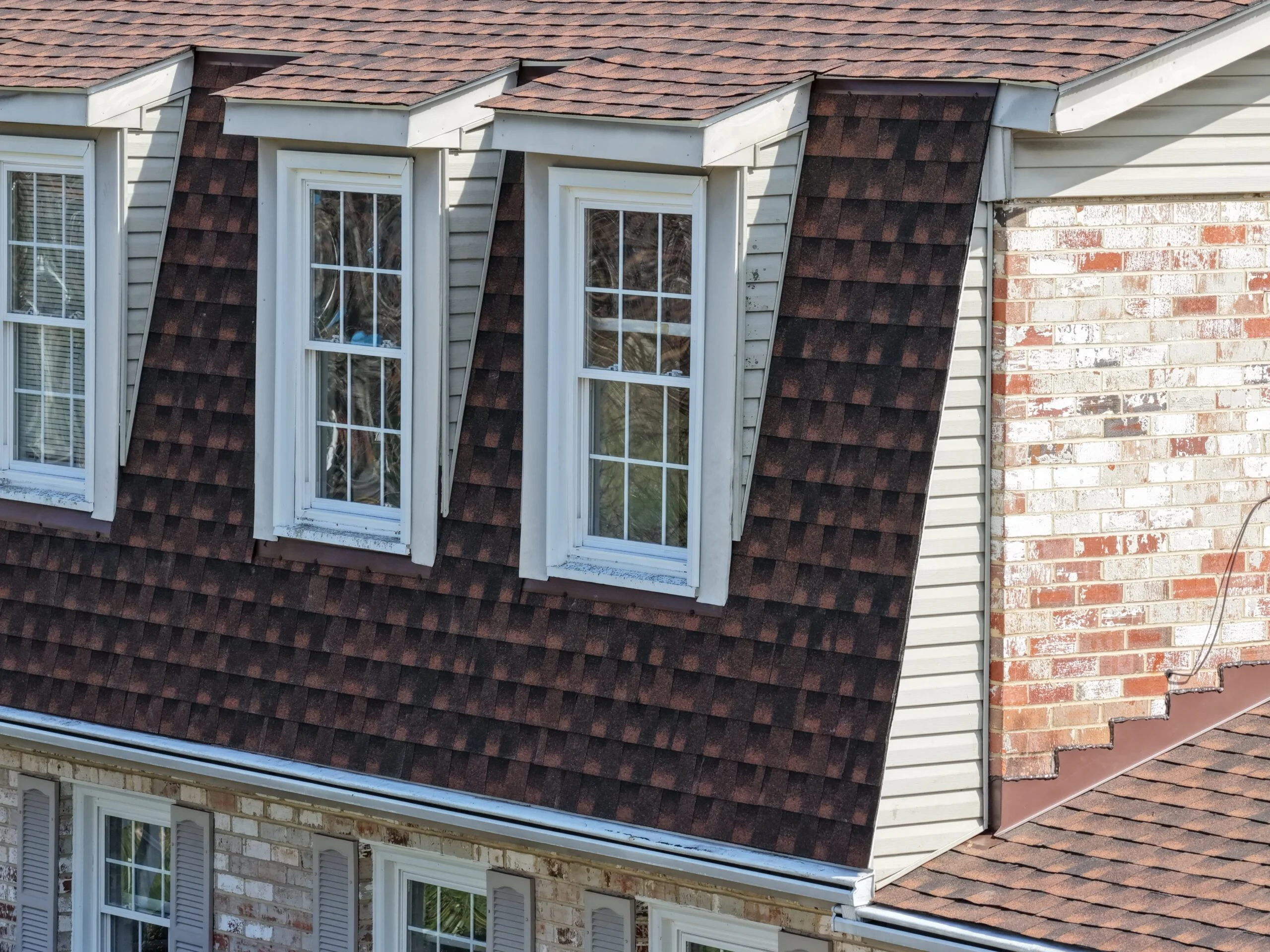 Aerial drone shot of new siding installation on Maryland residential home Crossroads Contracting LLC