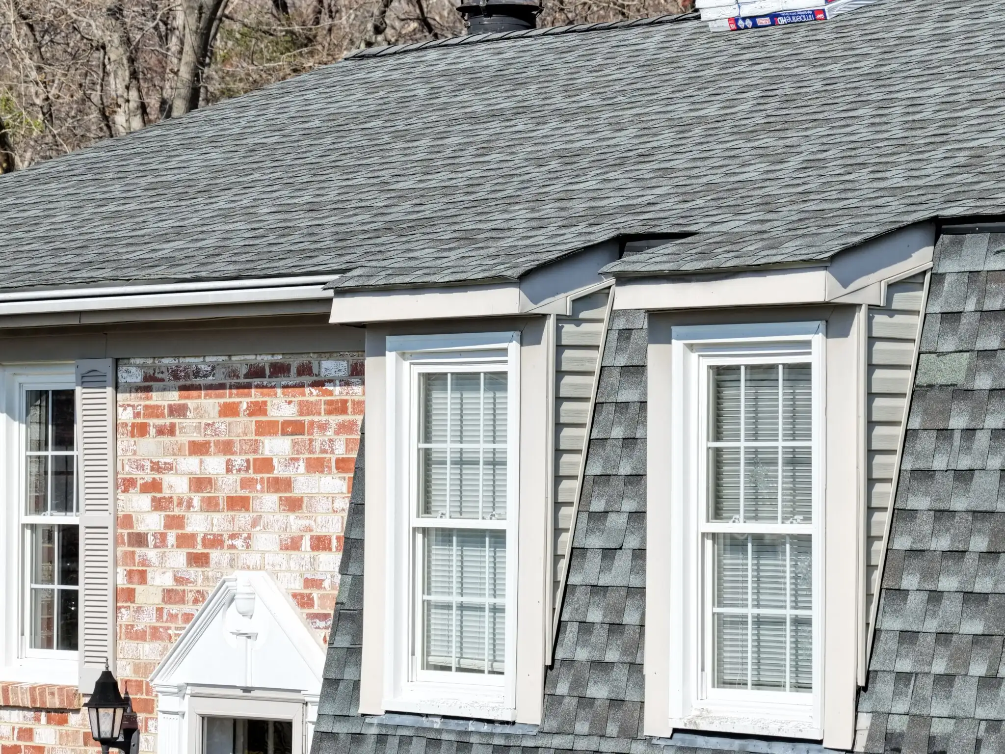 Drone view of new architectural shingle installation on Maryland home Crossroads Contracting LLC