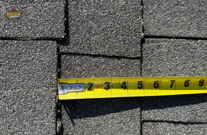 Roof blistering on asphalt shingles with raised bubbles and damaged granules