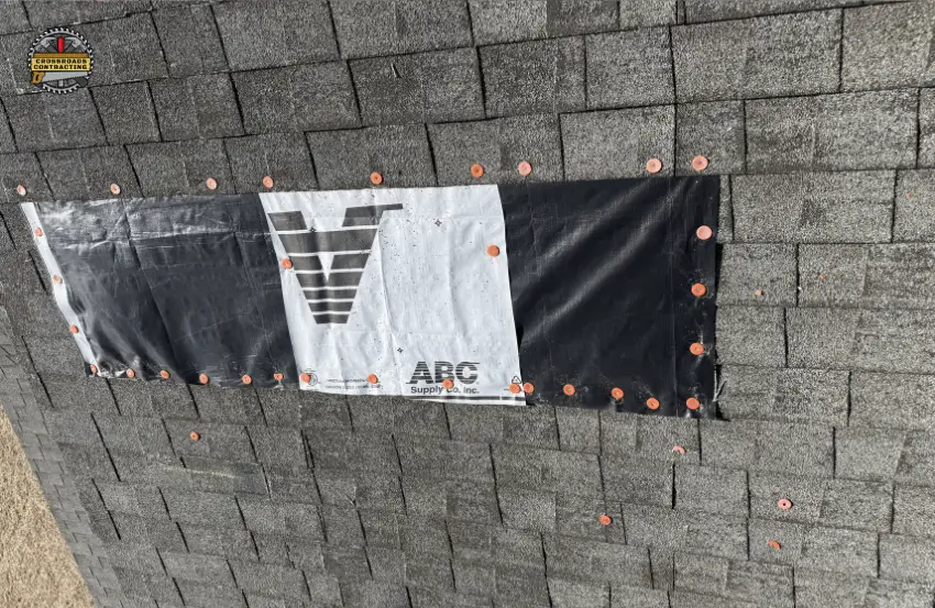 Roofing nail pops lifting asphalt shingles on a residential roof